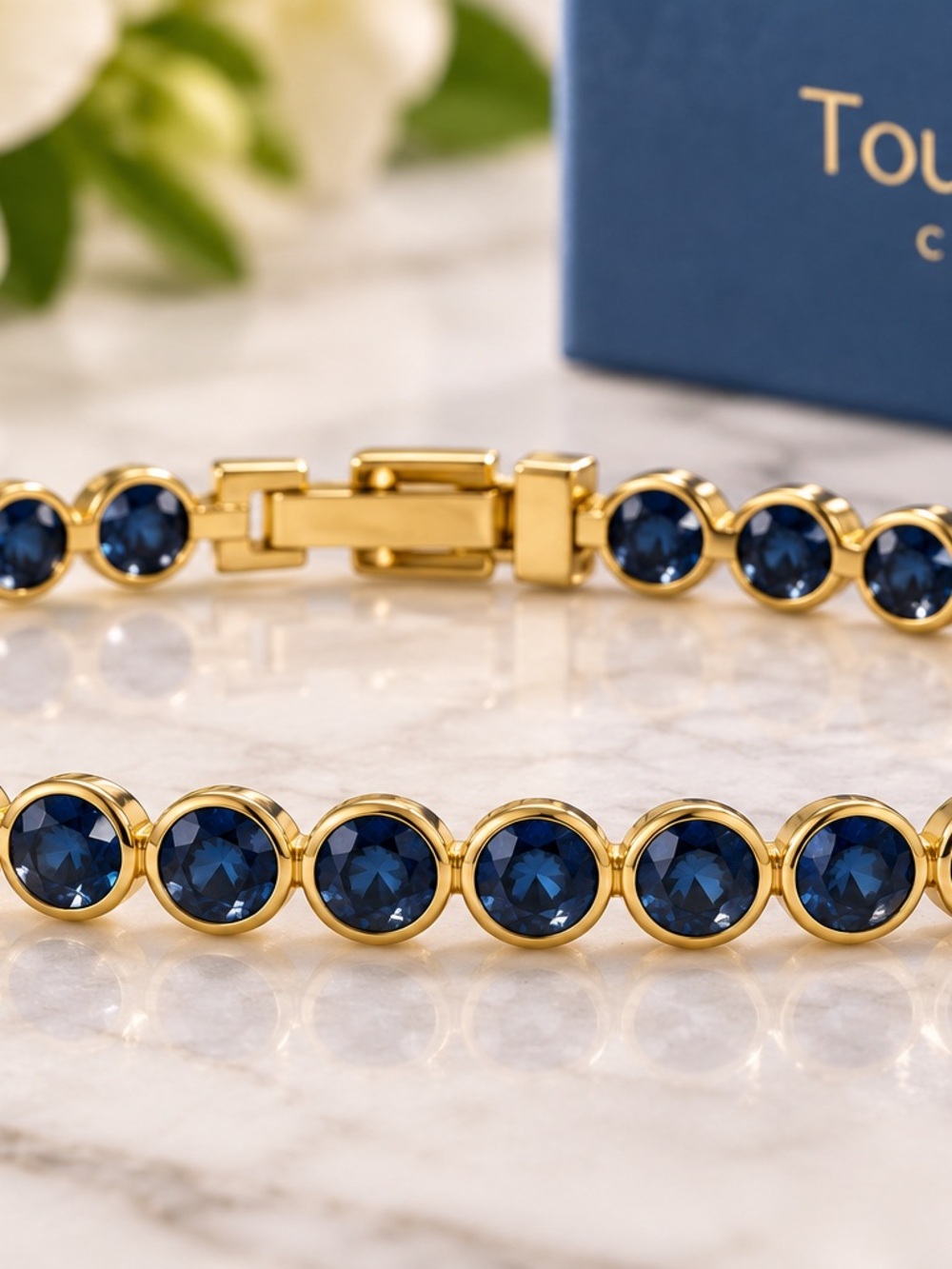Gold Tennis Bracelet with Deep Blue Crystal Accents